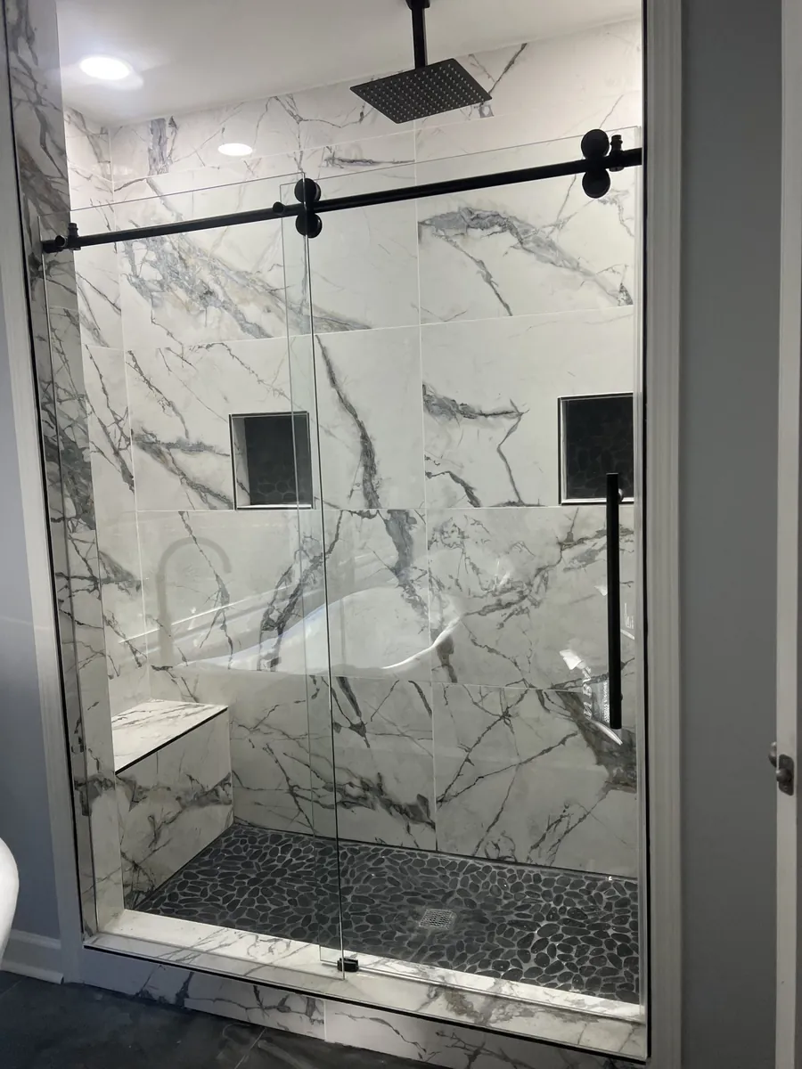 Tile shower with black fixtures in Hampton GA